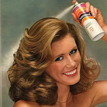 1970s Woman Applying Instant Shampoo Spray